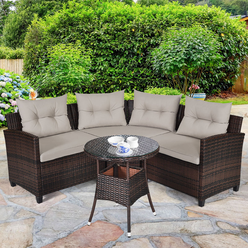 Ebern Designs Slaveyka Rattan Sectional Seating Group with Cushions Reviews Wayfair